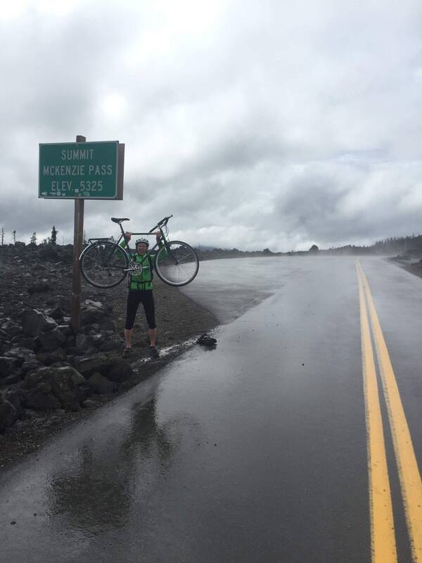 Brian adventure biking at McKenzie Pass summit