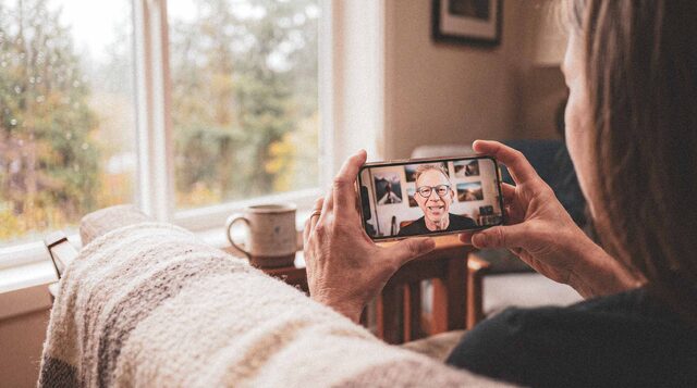A member checking in with Brian by video from home
