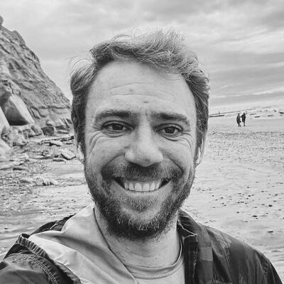 Black-and-white portrait of David P., a distance runner
